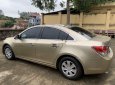 Chevrolet Cruze 2010 - Bán Chevrolet Cruze MT sản xuất 2010, màu vàng cát số sàn giá cạnh tranh