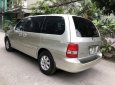 Kia Carnival 2009 - Bán xe Kia Carnival GS AT sản xuất 2009, màu vàng chính chủ