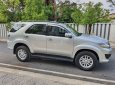 Toyota Fortuner 2014 - Cần bán gấp Toyota Fortuner MT năm 2014, màu bạc như mới