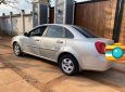 Daewoo Lacetti 2010 - Cần bán xe Daewoo Lacetti MT sản xuất năm 2010, màu bạc xe gia đình