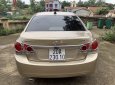 Chevrolet Cruze 2010 - Bán Chevrolet Cruze MT sản xuất 2010, màu vàng cát số sàn giá cạnh tranh