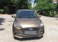 Hyundai Grand i10   2018 - Bán xe Hyundai Grand i10 đời 2018, màu vàng, số sàn