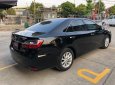 Toyota Camry 2016 - Cần bán Toyota Camry 2.0E năm sản xuất 2016, màu đen, 820tr