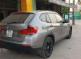 BMW X1   2010 - Cần bán xe BMW X1 đời 2010, màu bạc, xe nhập