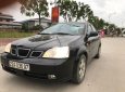 Daewoo Lacetti   2004 - Cần bán gấp Daewoo Lacetti đời 2004, màu đen