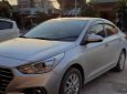 Hyundai Accent 2018 - Bán lại chiếc Hyundai Accent 1.4 AT bản tiêu chuẩn đời 2018, màu bạc, giao nhanh