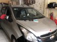 Chevrolet Spark 2016 - Cần bán Chevrolet Spark sản xuất 2016, màu vàng đã đi 82000 km, giá chỉ 215 triệu