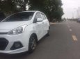 Hyundai Grand i10 2015 - Cần bán xe Hyundai Grand i10 đời 2015, màu trắng, xe nhập như mới