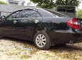 Toyota Corona 2003 - Cần bán lại xe Toyota Corona năm sản xuất 2003, màu đen, nhập khẩu