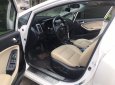 Kia Cerato 2016 - Bán gấp chiếc Kia Cerato AT, sản xuất 2016 màu trắng nhập khẩu nguyên chiếc, giá rẻ