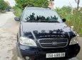 Kia Carnival 2009 - Cần bán gấp Kia Carnival năm 2009, màu đen, nhập khẩu nguyên chiếc giá cạnh tranh