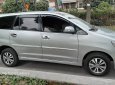 Toyota Innova 2015 - Gia đình cần bán xe Toyota Innova đời 2016, màu bạc, số sàn