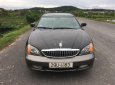 Daewoo Magnus 2004 - Cần bán xe Daewoo Magnus đời 2004, màu đen giá cạnh tranh