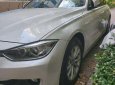 BMW 3 Series   2012 - Bán BMW 320i sản xuất năm 2012, màu trắng, nhập khẩu 