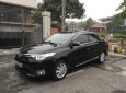 Toyota Vios 2014 - Gia đình cần bán chiếc Toyota Vios E MT sản xuất năm 2014, màu đen giá cạnh tranh