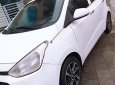 Hyundai Grand i10   2015 - Cần bán lại xe Hyundai Grand i10 đời 2015, màu trắng, xe nhập