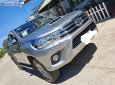 Toyota Hilux   2016 - Bán Toyota Hilux 3.0G 4x4 MT năm 2016, màu bạc, xe nhập 