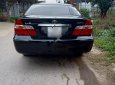 Toyota Camry 2002 - Cần bán gấp Toyota Camry sản xuất 2002, màu đen