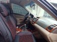 Toyota Camry 2002 - Cần bán gấp Toyota Camry sản xuất 2002, màu đen