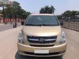 Hyundai Starex 2012 - Cần bán gấp Hyundai Starex MT năm sản xuất 2012, màu vàng số sàn, giá 453tr