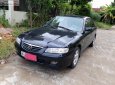 Mazda 626   2002 - Bán Mazda 626 2.0 MT đời 2002, màu đen, chính chủ