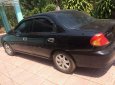 Kia Spectra   2004 - Cần bán Kia Spectra 1.6 MT đời 2004, màu đen, số sàn