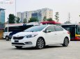 Kia K3 2014 - Cần bán gấp Kia K3 2.0 AT sản xuất năm 2014, màu trắng