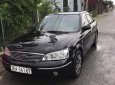 Ford Laser   2003 - Bán Ford Laser GHIA 1.8 MT sản xuất năm 2003, màu đen, 134 triệu