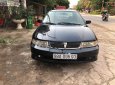 Mitsubishi Lancer GLXI 1.6 MT 2003 - Cần bán Mitsubishi Lancer GLXI 1.6 MT sản xuất 2003, màu xanh lam xe gia đình