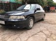 Mitsubishi Lancer GLXI 1.6 MT 2003 - Cần bán Mitsubishi Lancer GLXI 1.6 MT sản xuất 2003, màu xanh lam xe gia đình