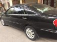 Toyota Camry   2003 - Bán Toyota Camry 3.0V sản xuất 2003, màu đen, xe gia đình