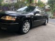 Ford Mondeo 2004 - Cần bán xe Ford Mondeo AT sản xuất 2004, màu đen