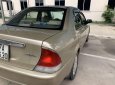 Ford Laser 2001 - Bán xe Ford Laser sản xuất năm 2001, màu vàng xe gia đình