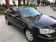 Ford Laser   Ghia AT   2006 - Bán ô tô Ford Laser Ghia AT năm sản xuất 2006, màu đen xe gia đình