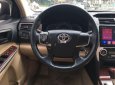 Toyota Camry 2014 - Cần bán gấp Toyota Camry 2.0E năm 2014, màu đen, 670tr