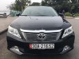 Toyota Camry 2014 - Cần bán gấp Toyota Camry 2.0E năm 2014, màu đen, 670tr