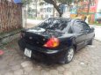 Kia Spectra 2005 - Cần bán gấp Kia Spectra năm 2005, màu đen