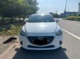 Mazda 2 2015 - Cần bán gấp Mazda 2 đời 2015, màu trắng, xe nhập chính chủ