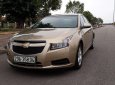 Chevrolet Cruze 2011 - Cần bán lại xe Chevrolet Cruze sản xuất năm 2011, màu vàng cát