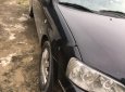 Ford Laser   2004 - Bán xe Ford Laser đời 2004, màu đen, nhập khẩu  