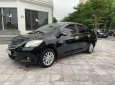 Toyota Vios 2011 - Bán Toyota Vios 1.5E MT sản xuất 2011, màu đen số sàn, giá tốt