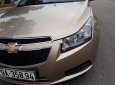 Chevrolet Cruze 2011 - Cần bán lại xe Chevrolet Cruze sản xuất năm 2011, màu vàng cát