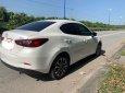 Mazda 2 2015 - Cần bán gấp Mazda 2 đời 2015, màu trắng, xe nhập chính chủ