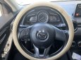 Mazda 2 2015 - Cần bán gấp Mazda 2 đời 2015, màu trắng, xe nhập chính chủ