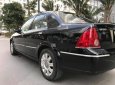 Ford Laser   Ghia AT   2006 - Bán ô tô Ford Laser Ghia AT năm sản xuất 2006, màu đen xe gia đình