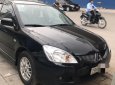 Mitsubishi Lancer     2004 - Cần bán Mitsubishi Lancer năm sản xuất 2004, nhập khẩu số tự động