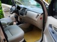 Toyota Innova 2.0E 2015 - Tôi cần bán chiếc xe ô tô Toyota Innova 2.0E màu ghi vàng 2014