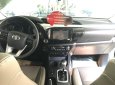 Toyota Hilux 2016 - Cần bán gấp Toyota Hilux đời 2016, màu trắng, xe nhập, số tự động, giá 730tr