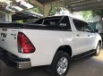 Toyota Hilux 2016 - Cần bán gấp Toyota Hilux đời 2016, màu trắng, xe nhập, số tự động, giá 730tr