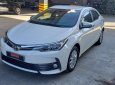 Toyota Corolla altis 1.8E CVT 2017 - Bán Toyota Corolla altis 1.8E CVT đời 2017, màu trắng, số tự động